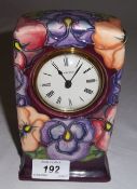 Moorcroft clock with flower design, dated '93 on base, ht approx 16 cm