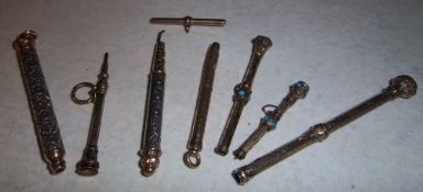 9ct gold propelling pencils, some jewelled, etc