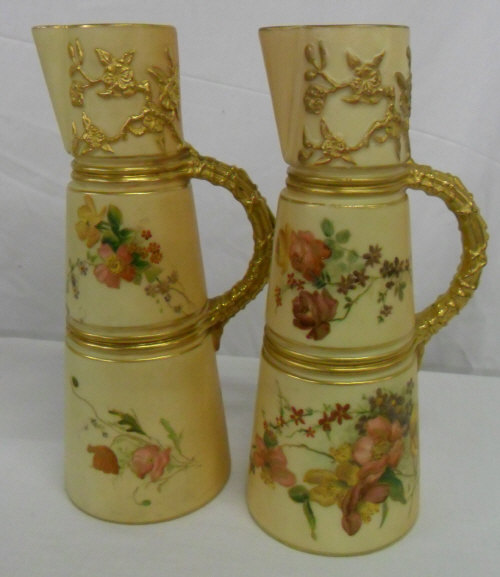 2 Royal Worcester ivory tapering claret jugs, size approx 21 cm