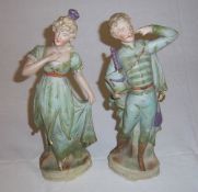 Pr of early 20th C figurines, ht approx 34 cm