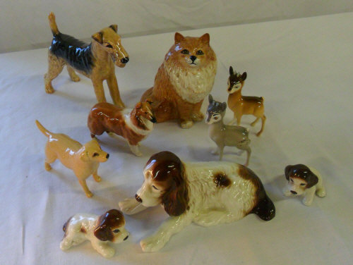 Beswick figurines inc fox terrier, collie, labrador, cat and 2 deer fawns & a Sylvac dog with 2