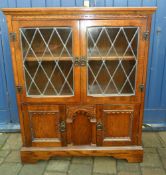 Priory style oak & leaded glass bookcase