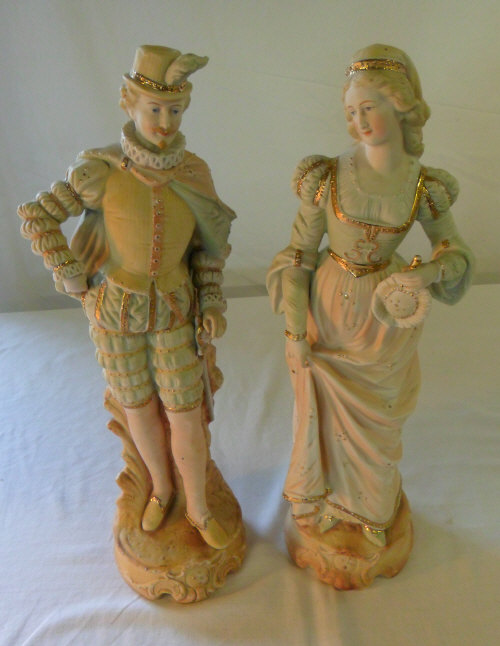 Pr of continental bisque figurines, ht approx 42 cm