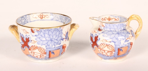 A Mason`s Ironstone miniature jug, a two-handled bowl with Imari style decoration and a flow blue