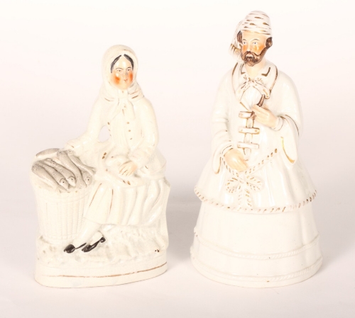 A 19th Century Staffordshire box and cover modelled as a Turk and a Staffordshire figure of a