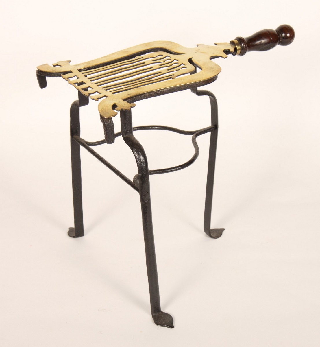 A 19th Century brass and wrought iron kettle stand