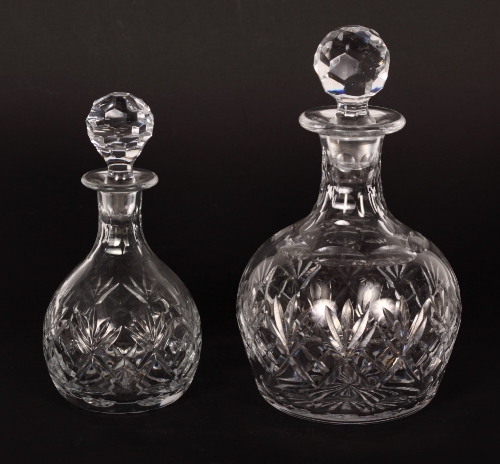 A Stuart cut glass bulbous decanter and a similar decanter