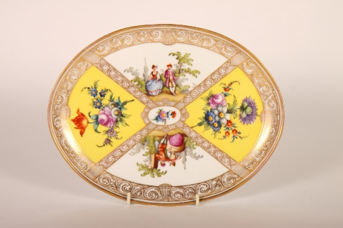 A Berlin porcelain oval dish with figures and floral panels