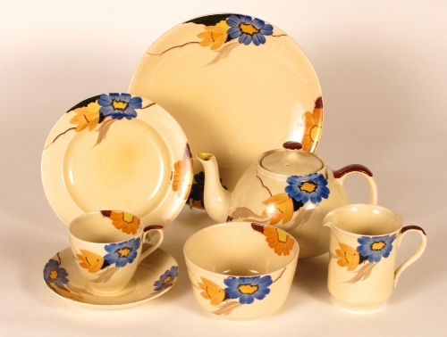 A 1930s Susie Cooper blue floral decorated part teaset