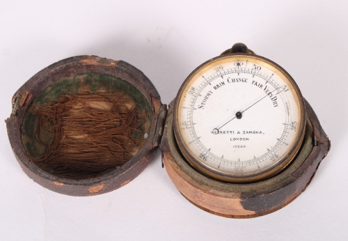 A Negretti & Zambra pocket barometer, in leather carrying case