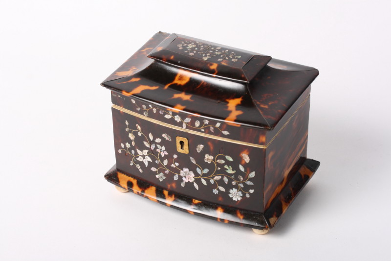 A late 18th Century shape front tortoiseshell and mother-of-pearl inlaid two-division tea caddy on