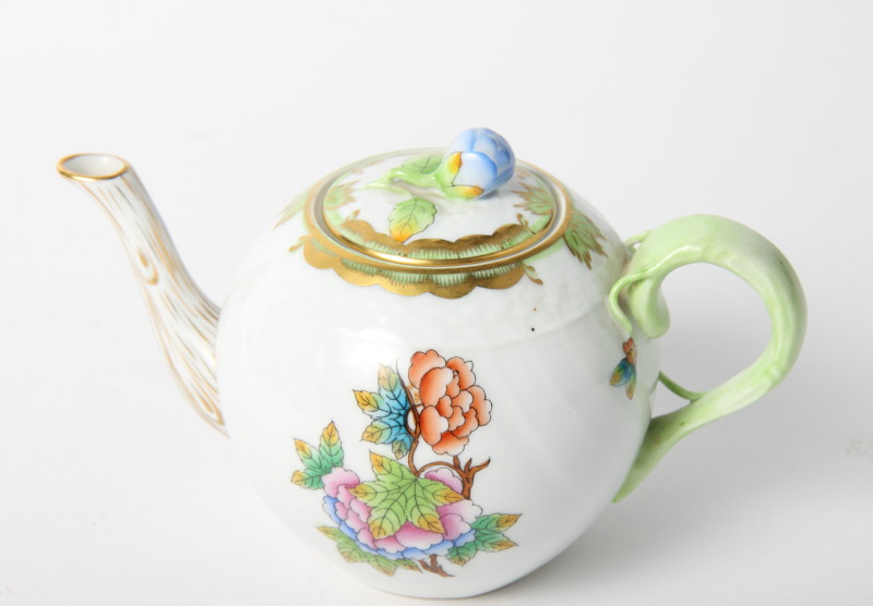 A Herend hand-painted teapot with floral decoration