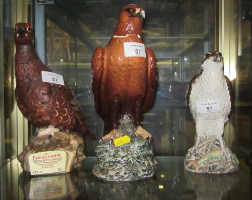 A Beswick golden eagle Beneagles whisky decanter, 8" high, a companion osprey decanter and a Doulton