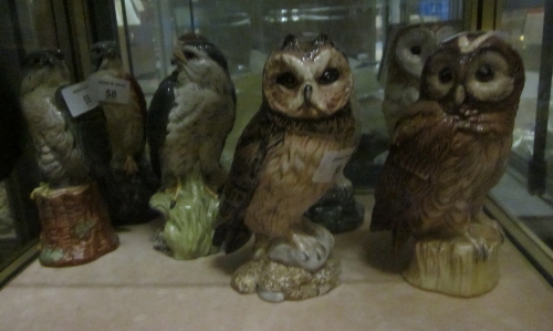 Four Beswick Beneagles owl whisky decanters and four Beswick Beneagles birds of prey whisky