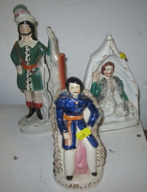 A Staffordshire figure, archer with deer, 10 1/2" high, a similar figure, "Albert", and a 19th