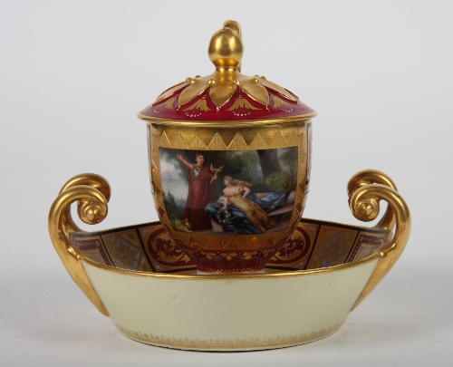 A Vienna cabinet cup with cover and two-handled deep saucer decorated in red and gilt and named