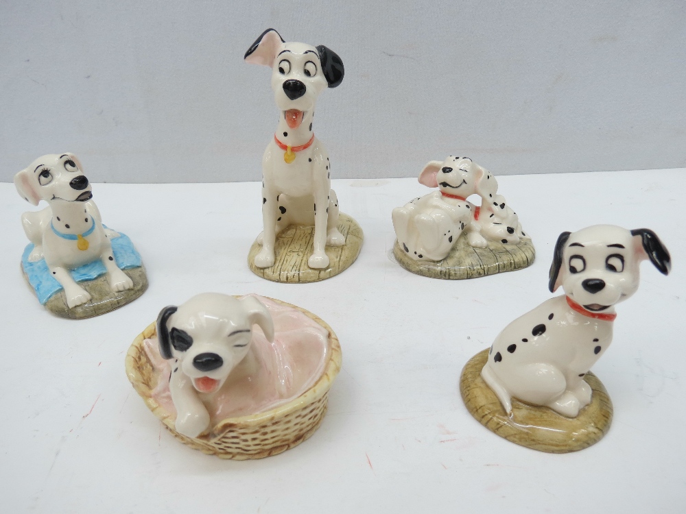 Five Royal Doulton 101 Dalmations figurines. 'Patch in basket', 'Perdita', 'Pongo', 'Lucky' and '