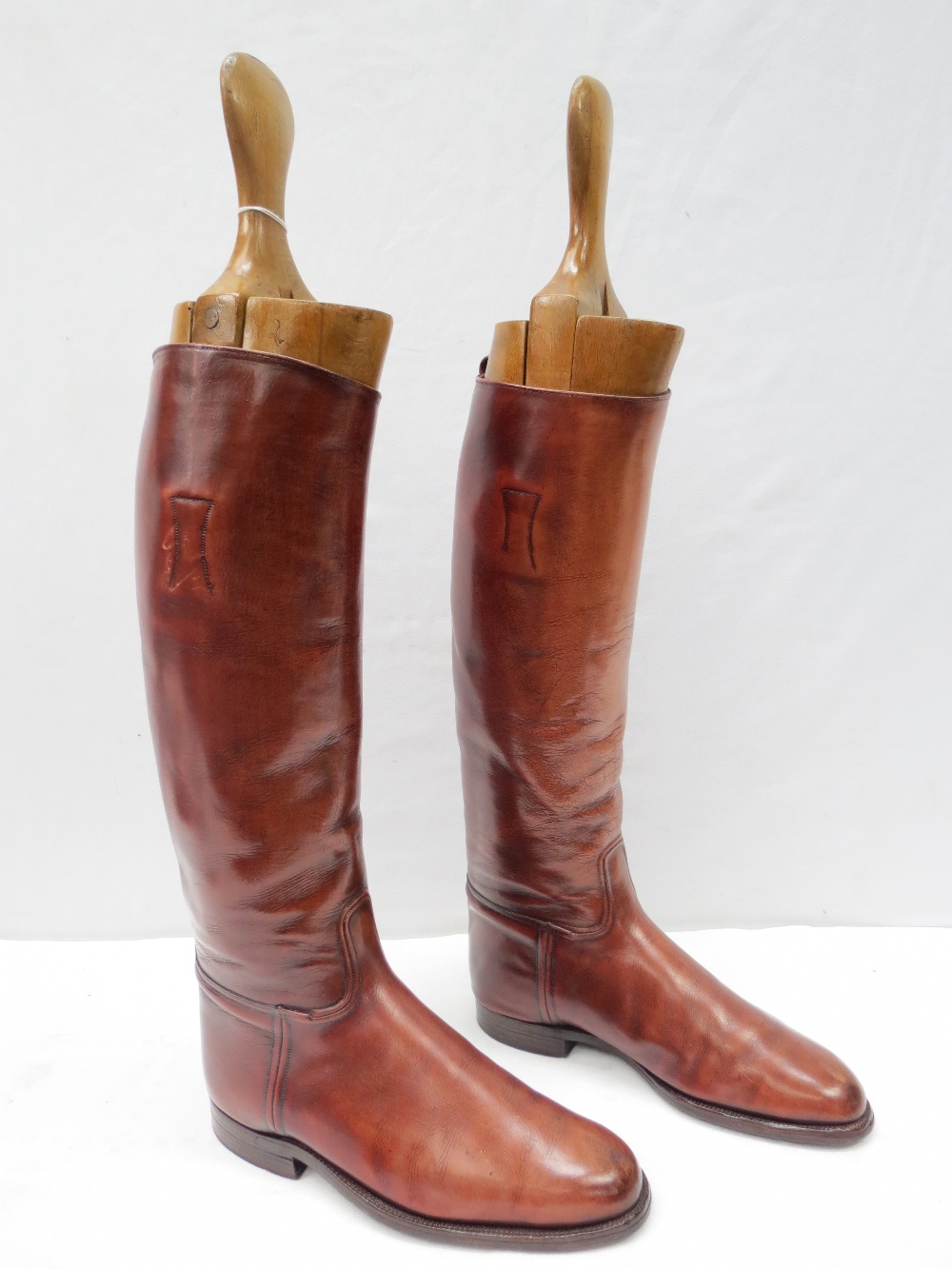 A pair of light tan leather riding boots with beechwood trees circa size 8.5/9.