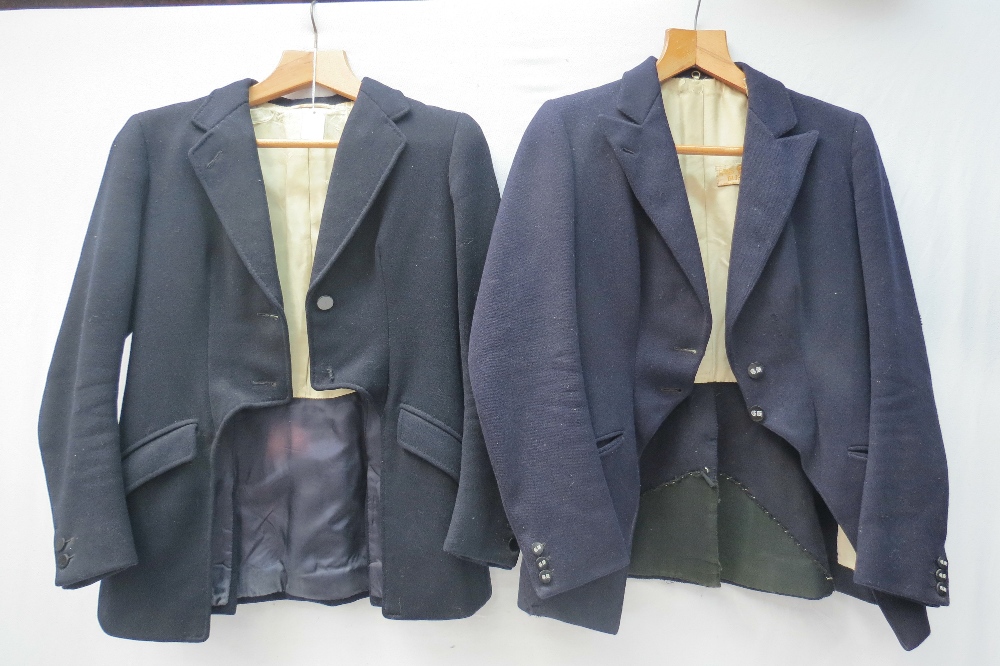 A Ladies cutaway navy blue hunting coat by Busvine of Brook Street having Grafton Hunt buttons (