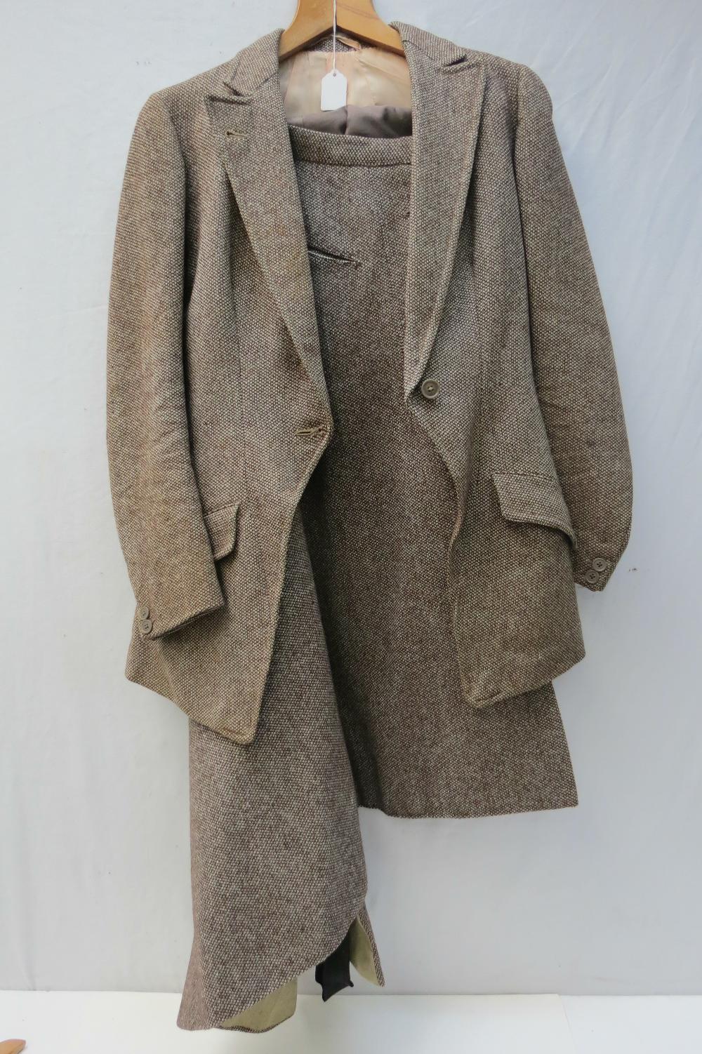 A ladies ratcatcher tweed riding coat and side saddle skirt by Robert Douglas (The Cripps) of New