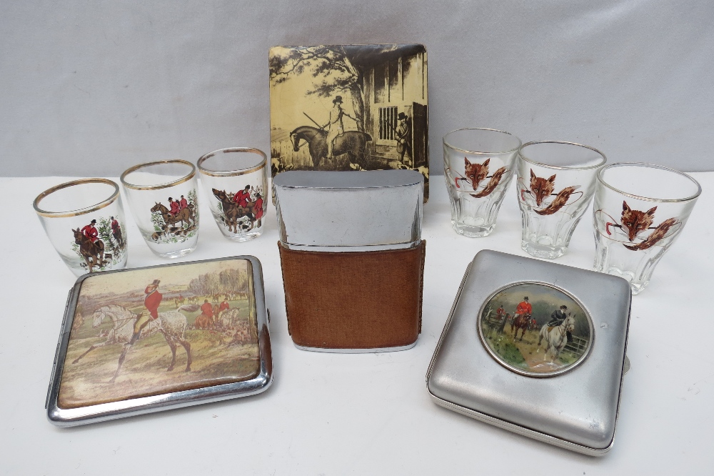 A set of six shot glasses with hunting motifs together with a wooden cigarette box with its exterior