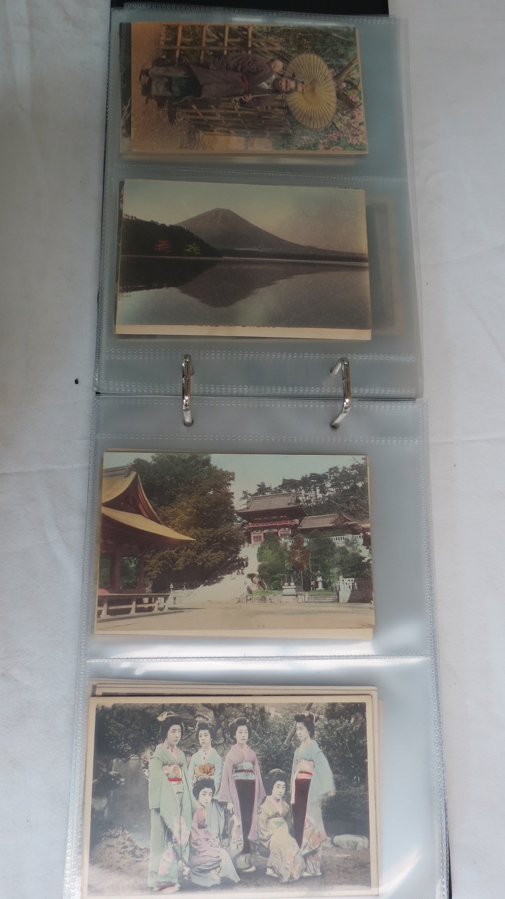 Postcards of Japan early 1900`s unusual collection of tapestry, scenic and lifestyle cards. 160