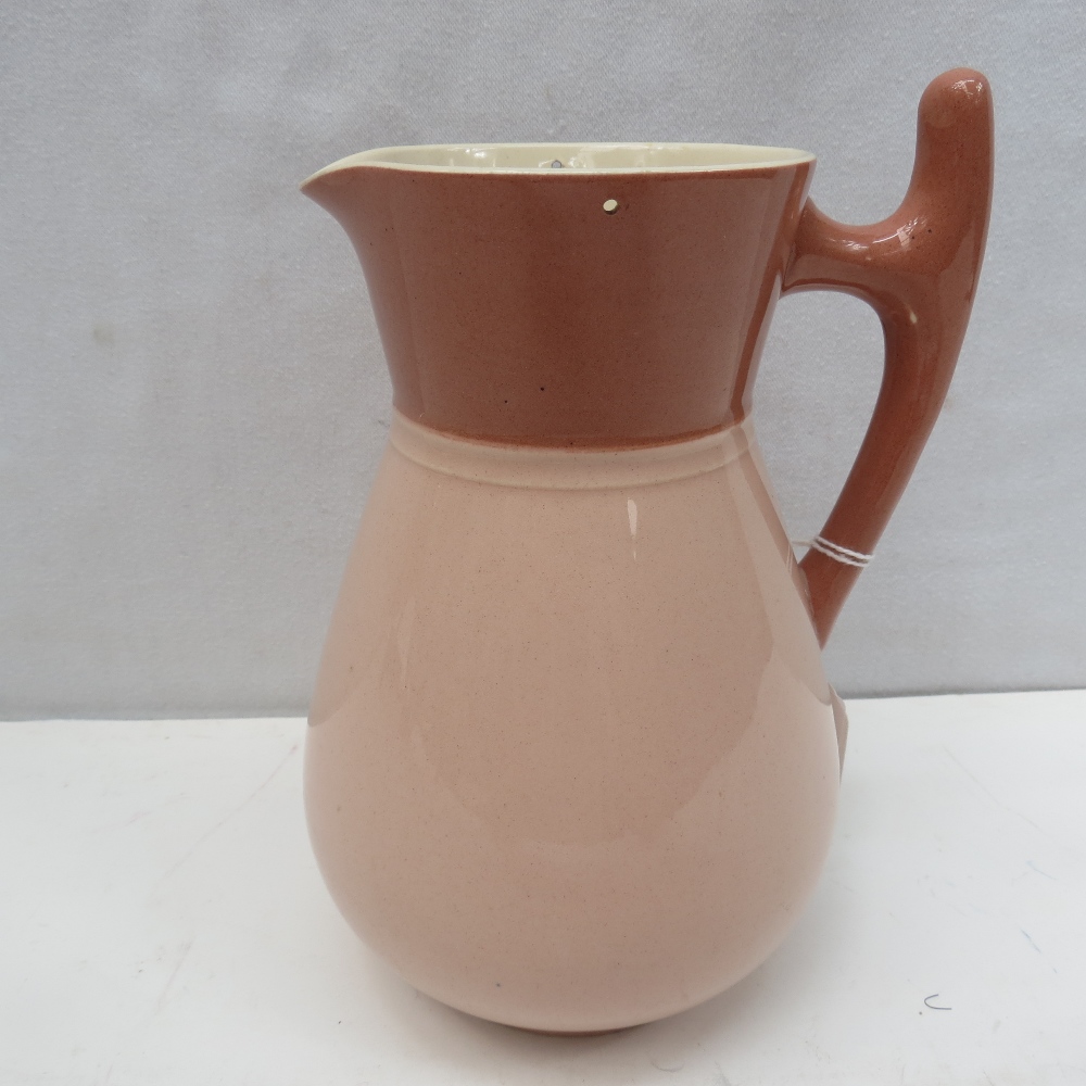 A James Macintyre early Moorcroft jug with 2-tone pink glaze, 18cm