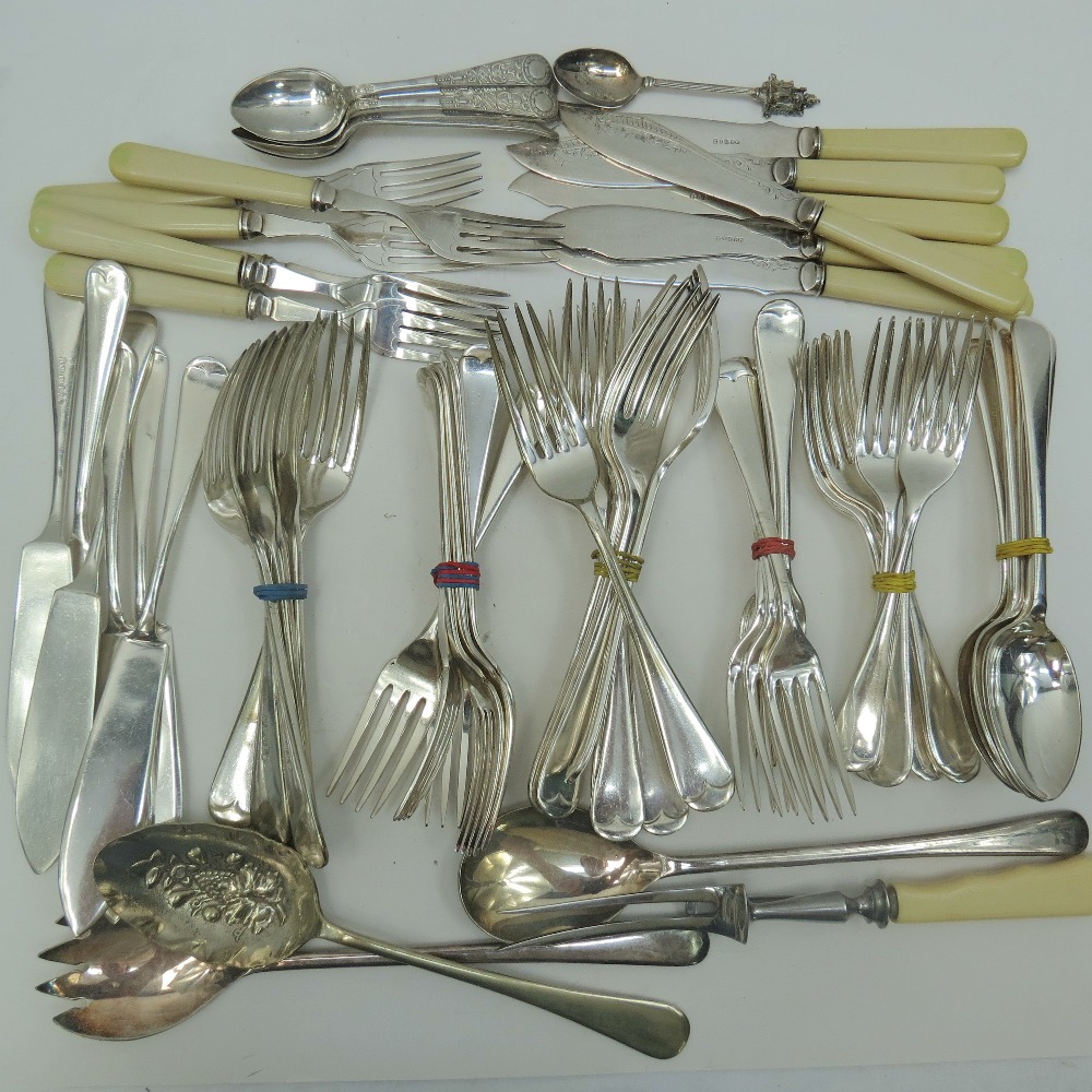 A large quantity of bone handled cutlery, silver plated flatware etc.