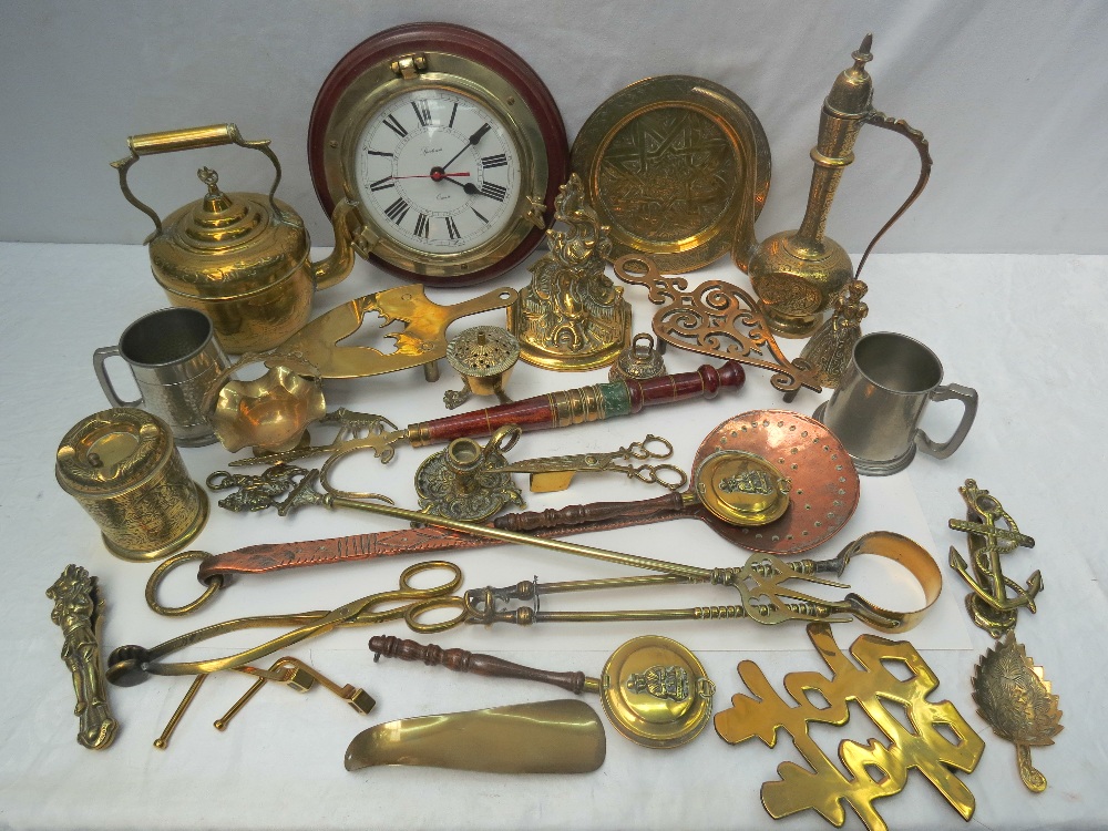 A quantity of brassware including trivets, kettle, coffee pot etc.