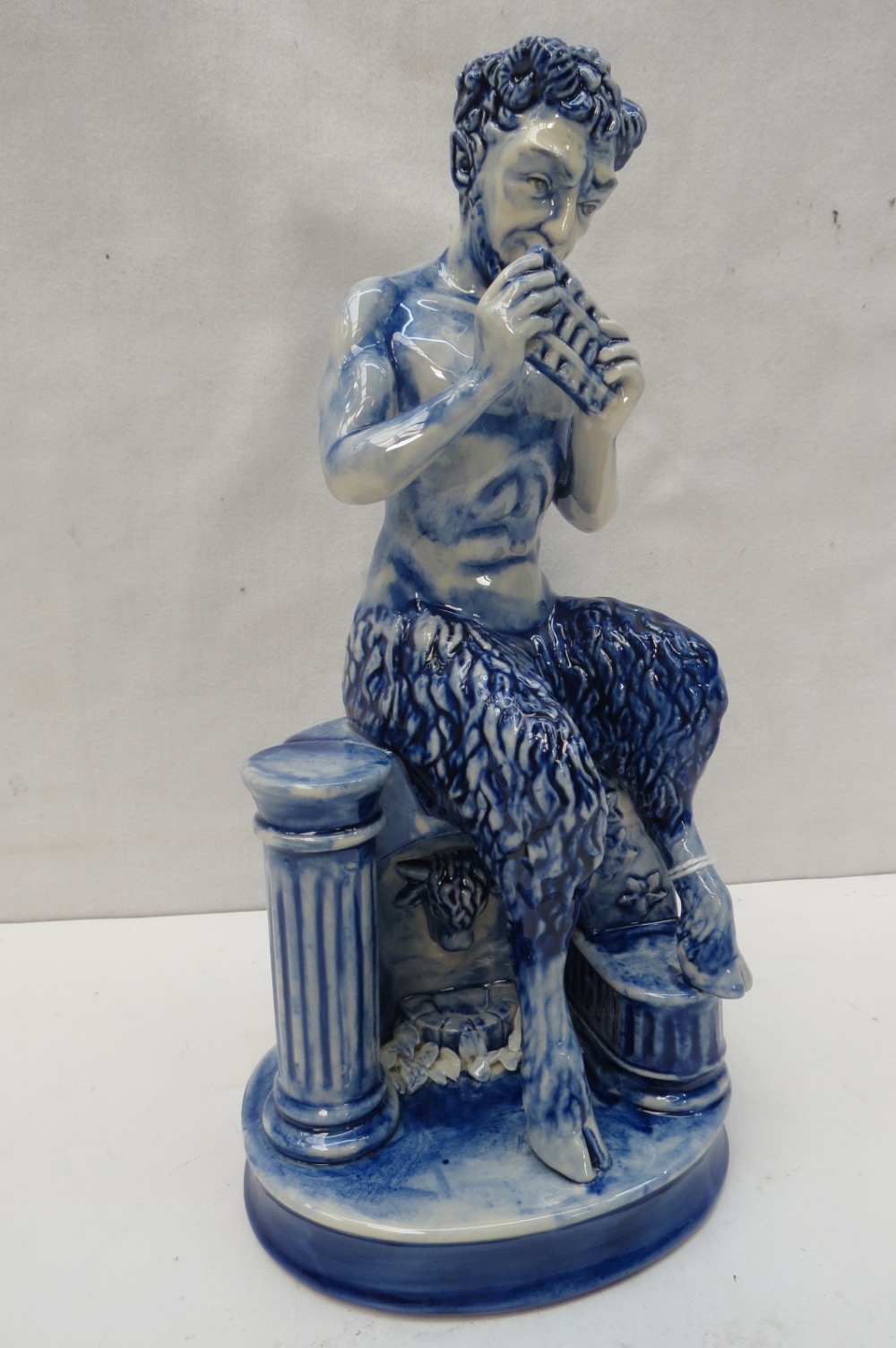 A Peggy Davies Ceramics figure "Pan" in rare blue colourway, 24cm.