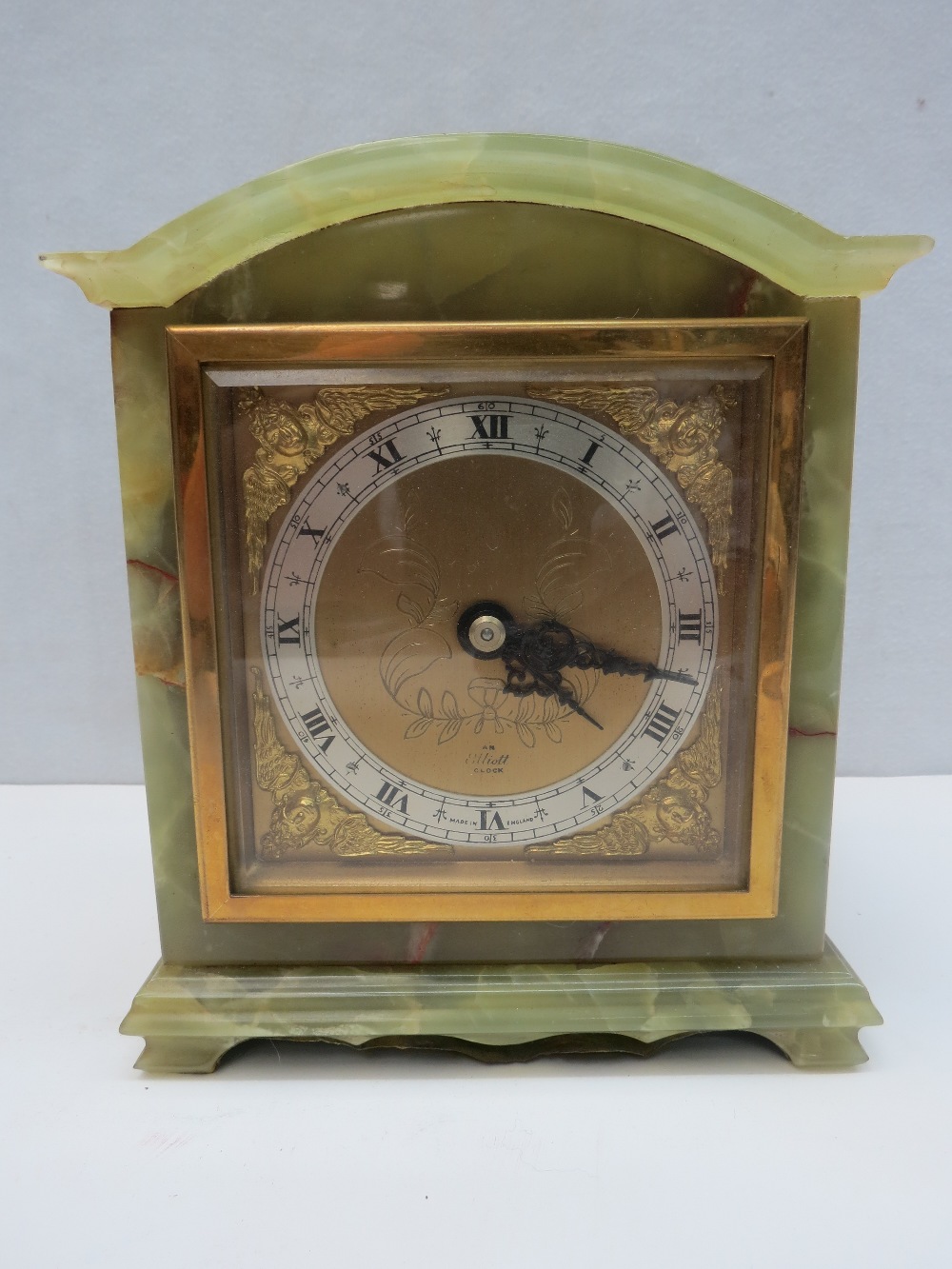 A marble cased 'Elliot' mantle clock, 16cm x 14cm x 7cm