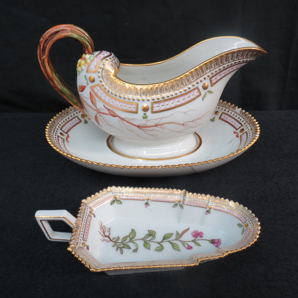 A superb Royal Copenhagen sauce boat from the Flora Danica service, having integral stand and