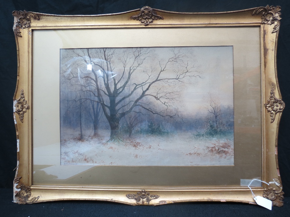 A. Ashdown. A large gilt framed watercolour of a woodland scene, 50cm x 34cm.