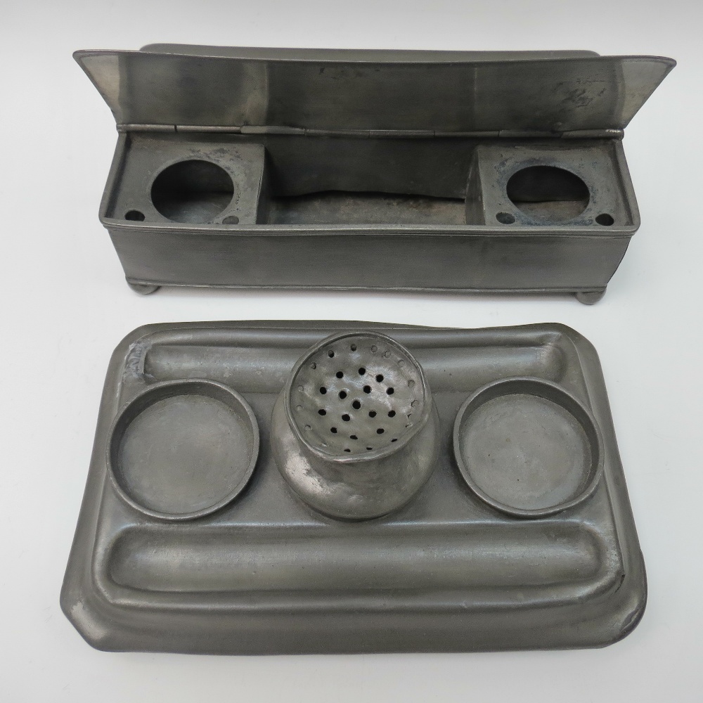 A 19thC pewter desk box with hinged lids together with a similar pewter desk stand with inkwells,