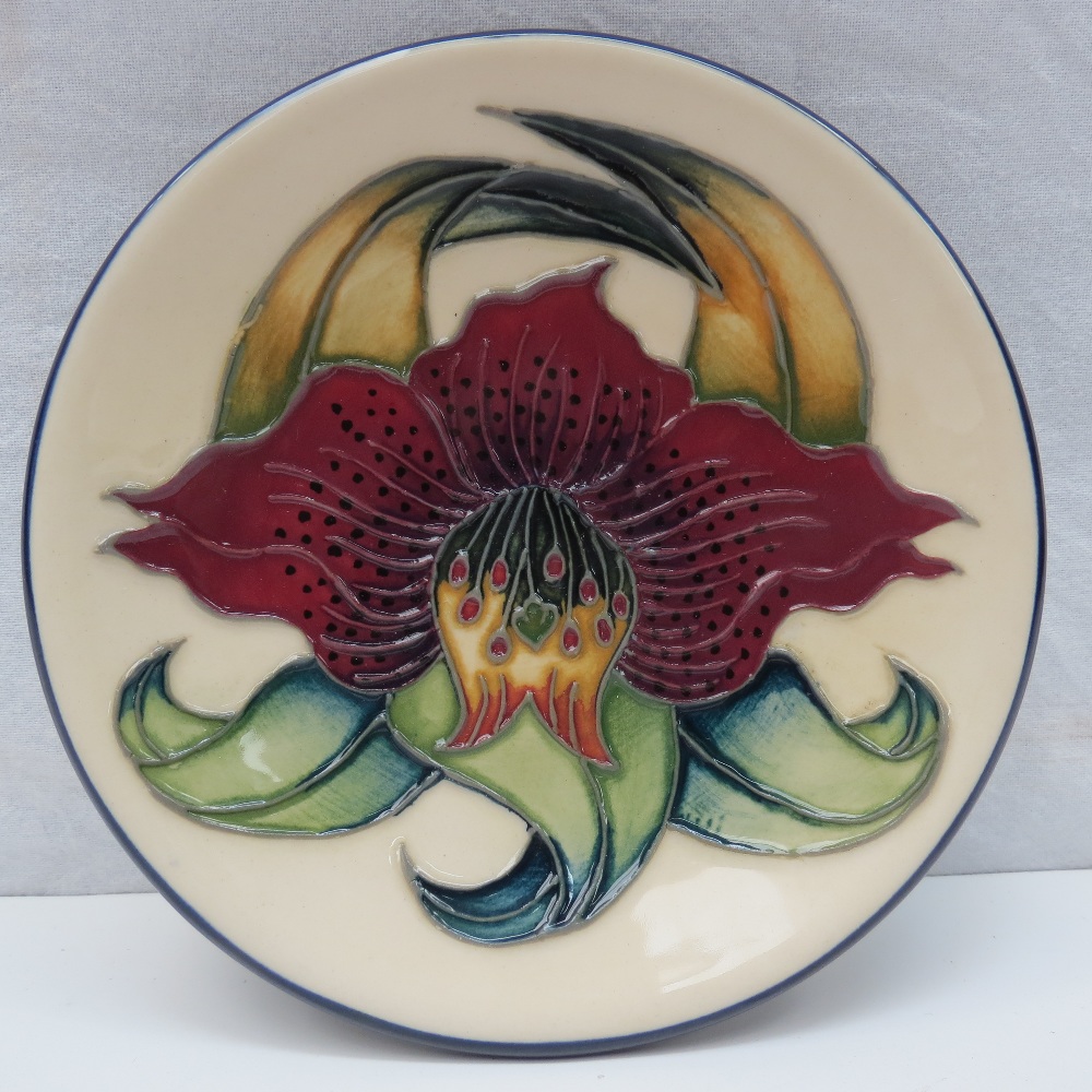 A Moorcroft pottery dish with Anna Lily design.