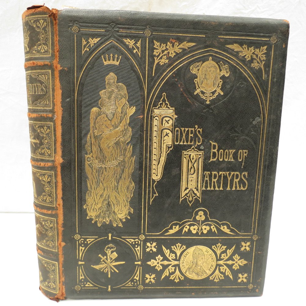 Foxes Books of Martyrs (1873 Ed) in heavily embossed full leather binding with a number of gruesome