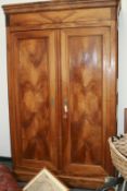A LARGE CONTINENTAL WALNUT ARMOIRE