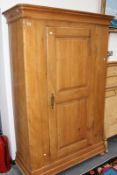 A CONTINENTAL PINE WARDROBE