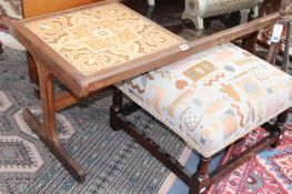 A RETRO TEAK COFFEE TABLE AND A MODERN FOOTSTOOL