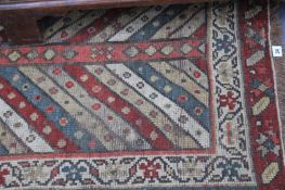 AN ANTIQUE PERSIAN HALL RUNNER