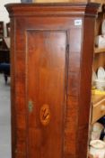 A GEORGIAN MAHOGANY SMALL CORNER CABINET