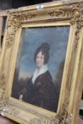 AN EARLY 19TH.C.OIL ON CANVAS PORTRAIT OF A LADY INSCRIBED AND DATED VERSO 1832