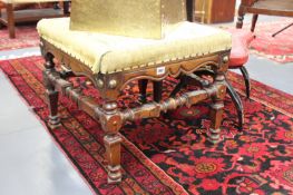 AN 18TH.C.STYEL WALNUT STOOL WITH NEEDLEWORK SEAT