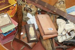 TAXIDERMY.OTTER AND FOX MASKS, TAILS AND PAWS, VARIOUS HUNT MAPS, RIDING CROPS, BINOCULARS,ETC