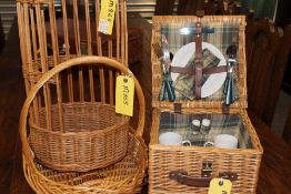 A PICNIC HAMPER AND TWO BASKETS