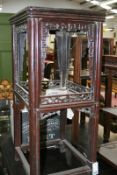 AN ANTIQUE CHINESE CARVED HARDWOOD STAND