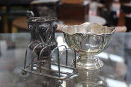 AN ANTIQUE HALLMARKED SILVER CHRISTENING CUP, A SMALL ROSE BOWL AND A TOAST RACK