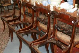 A SET OF FOUR REGENCY SIDE CHAIRS