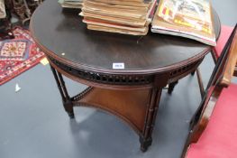 AN EDWARDIAN CHIPPENDALE STYLE CIRCULAR OCCASIONAL TABLE