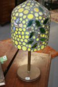 AN ARTS AND CRAFTS STYLE TABLE LAMP WITH LEADED GLASS SHADE